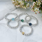 sterling silver gemstone stacking ring flatlay